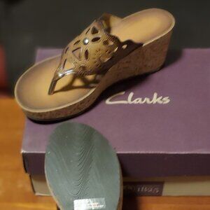 Clarks wedge sandal in a neutral tan shade